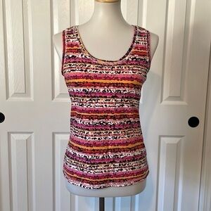 Women’s thick sleeved gym tank top with built in bra. Perfect for working out.